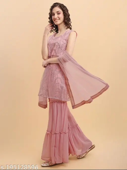 Pink net and georgette printed kurta set with dupatta and palazzos, featuring sleeveless style and silver zari and beads print on kurta. Lace border on dupatta. Perfect for traditional functions, family events, festivals, weddings, and other special occasions. Made in India