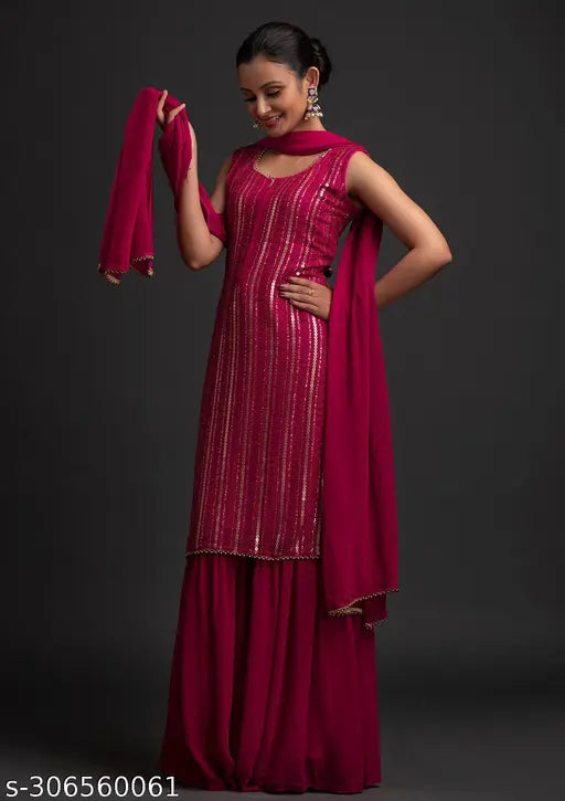 Red embroidered chiffon kurta set with matching sharara, ideal for festive wear