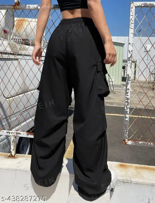 Black cotton high-waisted baggy pants, knee-length, no pockets or embellishments