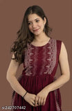 Rayon printed maroon straight Nayra cut kurti for women, sleeveless with embroidered pattern. Single size options: S-XXXL (Bust Size 36in - 46in; Length 50in). Indian fashion for modern weddings and events
