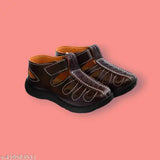 A pair of kids fancy brown sandals with a sporty design