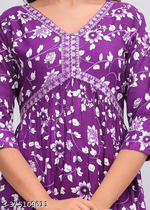 Rayon, three-quarter sleeve Aliya print kurti. Women's Nayra cut straight gown with embroidery