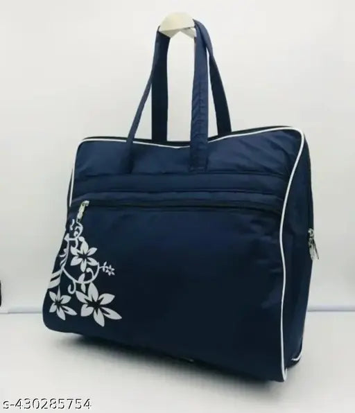 Navy blue handbag with floral embroidery and white trim