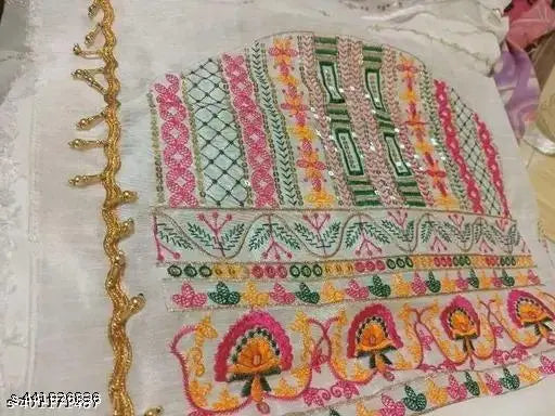 White sari, golden trim with floral designs