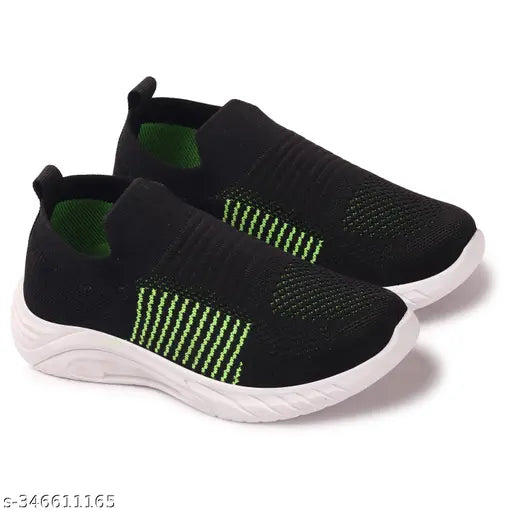 Comfortable, black running shoes with neon accents for kids aged 5-12. Suitable for boys and girls. Sole design suggests good grip