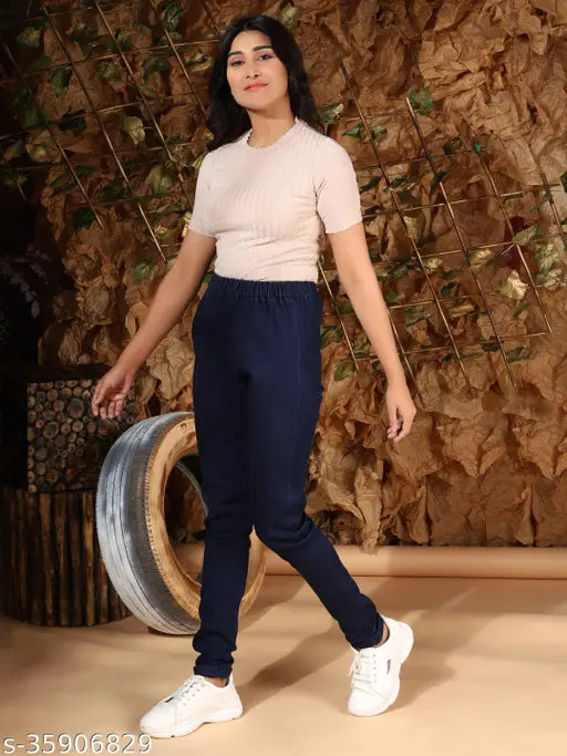 Solid navy blue denim jeggings for women, stretchable medium waist and elastic closer ankle length