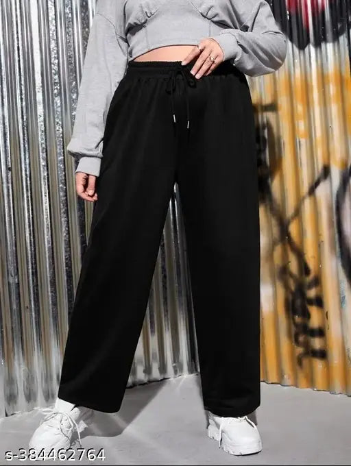 Black tracksuit bottoms, elastic waistband