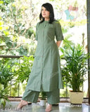 Green cotton A-line kurta set with striped design, three-quarter sleeves, calf length, paired with coordinating green palazzos for daily wear