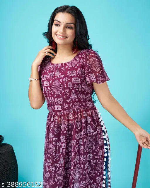 A maroon, patterned mid-length dress in the style of a Nayra cut Kurti
