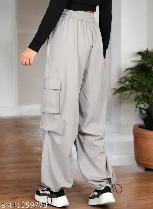Grey cargo-style women's track pants with multiple pockets, elastic waist, ideal everyday and active wear