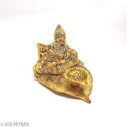 Gold-colored metal Kuber statue, intricate design, for home decoration or temple use