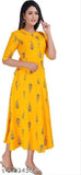 Yellow rayon printed Aline kurti with three-quarter sleeves, popular women's fashion for versatile styling, made in India