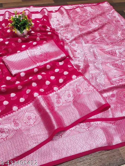 A saree with a pink base and floral embroidery patterns