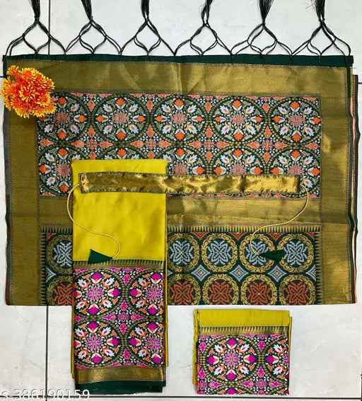 Unstitched art silk South Indian half saree set, featuring choli, dupatta and litchi silk zari work with solid patterns. Set includes tussled fabric and belt." (124 characters)
