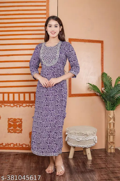 Purple rayon anarkali kurti with three-quarter sleeves, printed combo. Fashionable Indian women's outfit on display