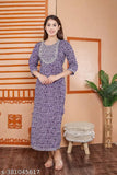 Purple rayon anarkali kurti with three-quarter sleeves, printed combo. Fashionable Indian women's outfit on display