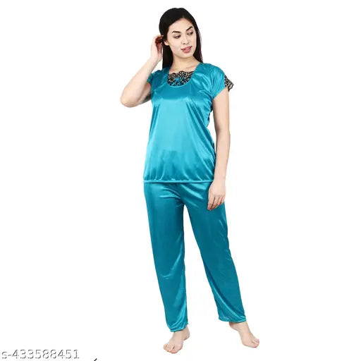 Satin printed nightsuits set for women and girls, featuring short-sleeved tops and pyjama bottoms made from satin material. Available in sizes M, L, XL (32", 34", 36" bust; 36", 38", 40" waist; 34", 36", 38" hip; 40", 42" length). Origin: India