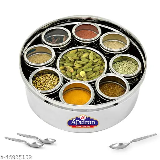 Multi-colored spice assortment in round glass jars