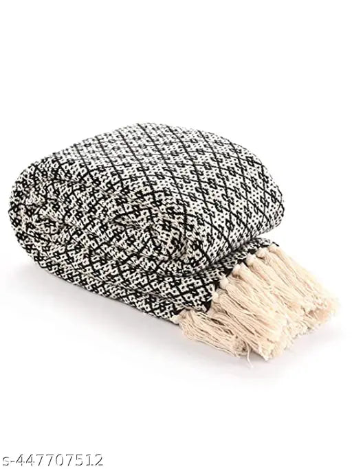 Soft cotton checked throw blanket, ideal for cozy living rooms
