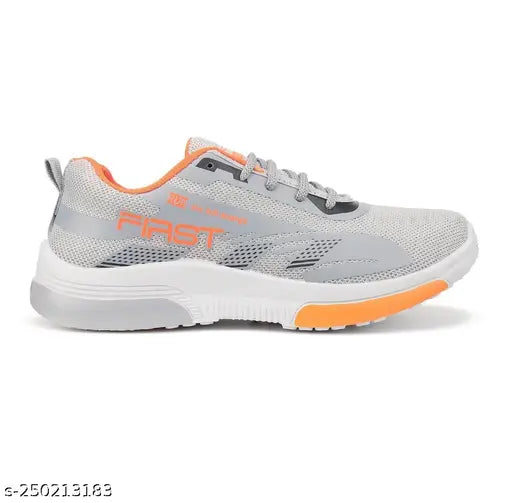 Black running shoes with orange accents for kids
