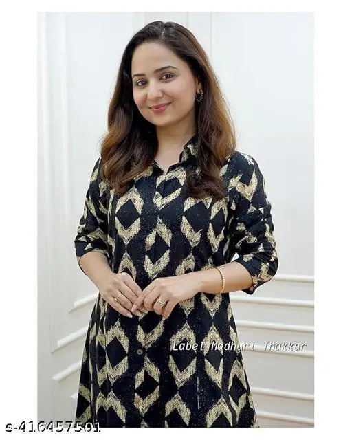 Black rayon cotton kurti set with printed net pattern, flattering fit, perfect for daily wear or special occasions. Made in India