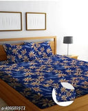 Attractive cotton double fitted bedsheet with 2 large pillow covers, botanical print, ideal for summer. Elastic fitted sheets on king size mattress. Made in India