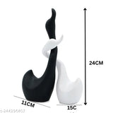White and black large ceramic Lucky Swan Couple figures for home decor, exquisitely crafted with piano finish. Perfect for table top showpieces & collectibles, durable and versatile home decor. Great gift option, easy to care for. Indian origin