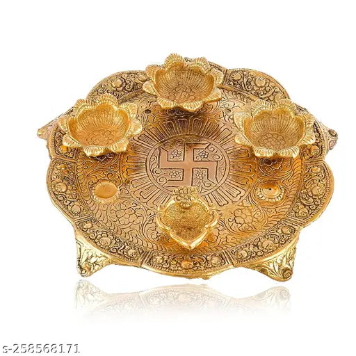 Gold plated pooja thali set with 4 diyas (1 piece), handicraft metal artifact for home, temple, office decoration. Measures 10x10x5 cm. Indian-made