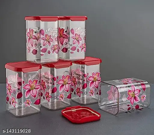 The image shows a collection of plastic containers designed for food storage. These containers have red lids and are stacked together, showcasing their clear bodies with decorative flower prints. There is also a small container placed separately. These products are likely intended for use in the kitchen to store groceries, as suggested by the image's title. The 1100 ml capacity of these containers makes them suitable for storage or meal prep