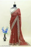 Red saree with cutwork mirror detailing