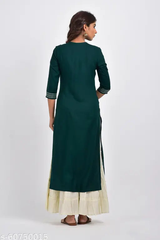 Green plus-size embroidered rayon straight kurta, ideal for women's fashion. Rayon three-quarter sleeves, available in sizes XXL to 6XL