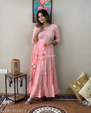 Women's cotton printed pure Lurex gown with attached cotton blend lining, adorned with intricate handwork on nack. Three-quarter sleeve A-line round neck dress in solid combo, perfect for western wear