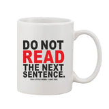 White ceramic coffee mug with print
