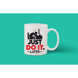 Coffee mug with black text that reads "I just do it. LATER
