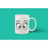 A white ceramic coffee mug with a printed face and a handle
