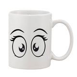 Printed ceramic coffee mug with white handle, 11oz, features a cartoon face design
