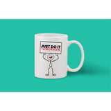 White ceramic coffee mug with handle, printed graphic, 'just do it tomorrow