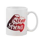 Coffee mug with printed graphic, stay strong slogan, and 11 oz size in white