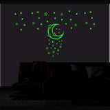 Green vinyl galaxy wall sticker with moon, peel-and-stick, size 119x68cm. Relaxing decor for a calming bedroom environment