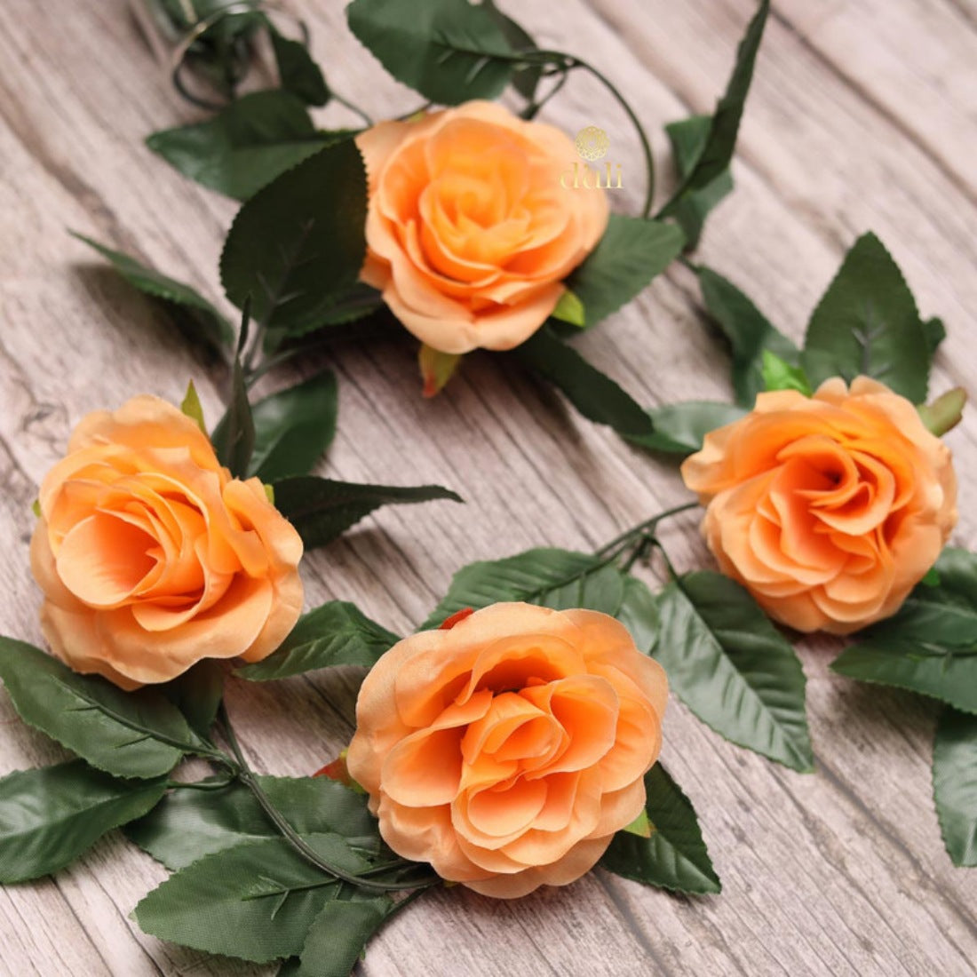 Peach silk-polyester artificial rose vine flowers with green leaves, ideal for home party garden wall decoration