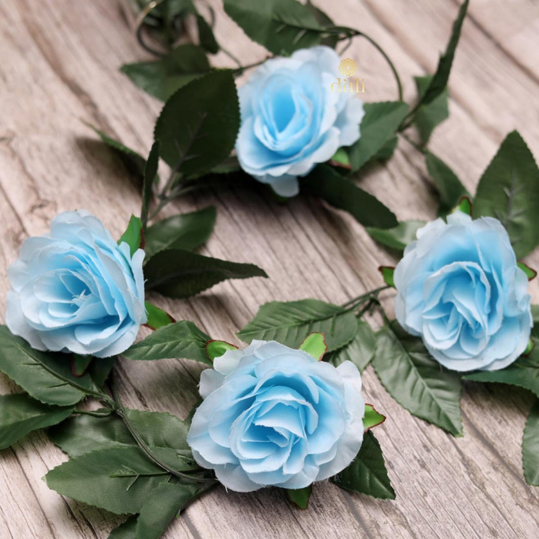 Blue silk-polyester artificial rose vine with green leaves, ideal for home party garden wall decoration